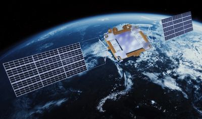 A satellite orbiting Earth with solar panels extended.