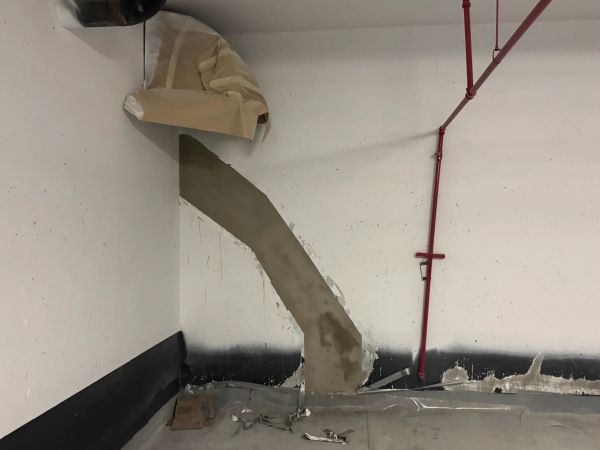 Crack has been injected and coated with waterproofing ready to be painted.