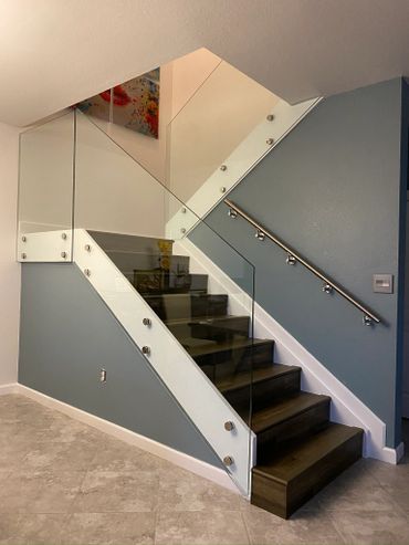 Glass stair handrails