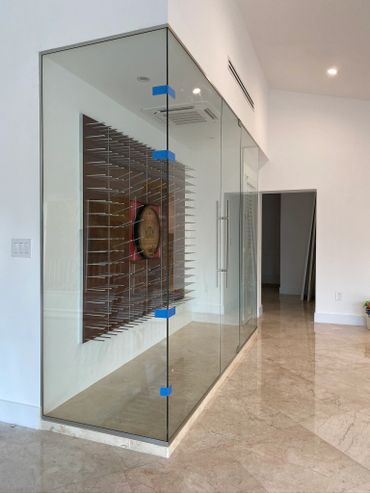 Frameless custom glass wine storage