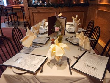 set table in a restaurant with menus