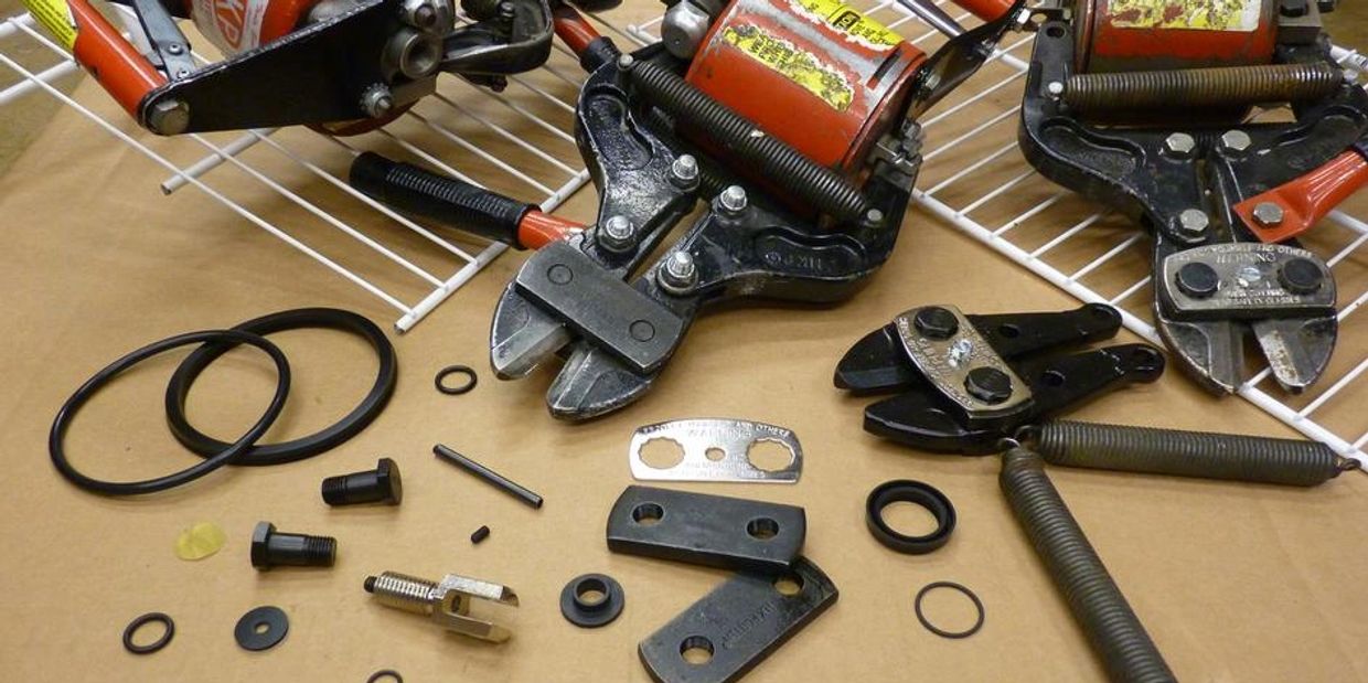 three HK Porter 9190 pneumatic closet wire shelving cutters along with parts for the HK Porter 9190