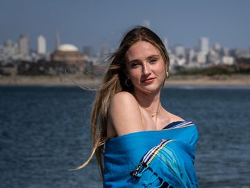 Portrait at Crissy Field with San Francisco in the background.