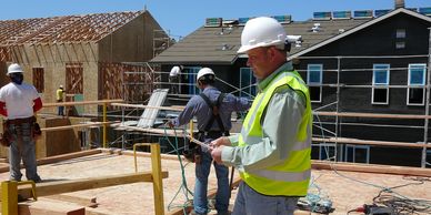 Men fitting cable on the Trish construction site