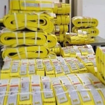 Stacks of yellow cable protectors or covers.
