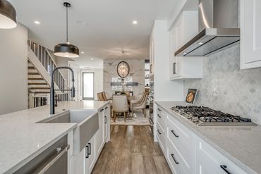 Galley kitchen with high quality finishes. 