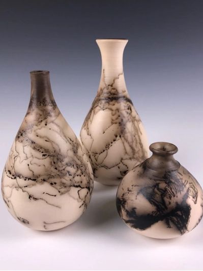 Three Raku horse hair pottery vases for sale at Artyard Studio in Williamsville NY.