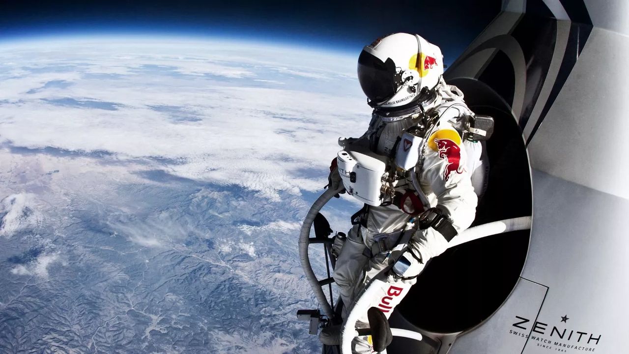 Astronaut in Red Bull suit preparing for skydive from the edge of space, showcasing a daring guerrilla marketing campaign.