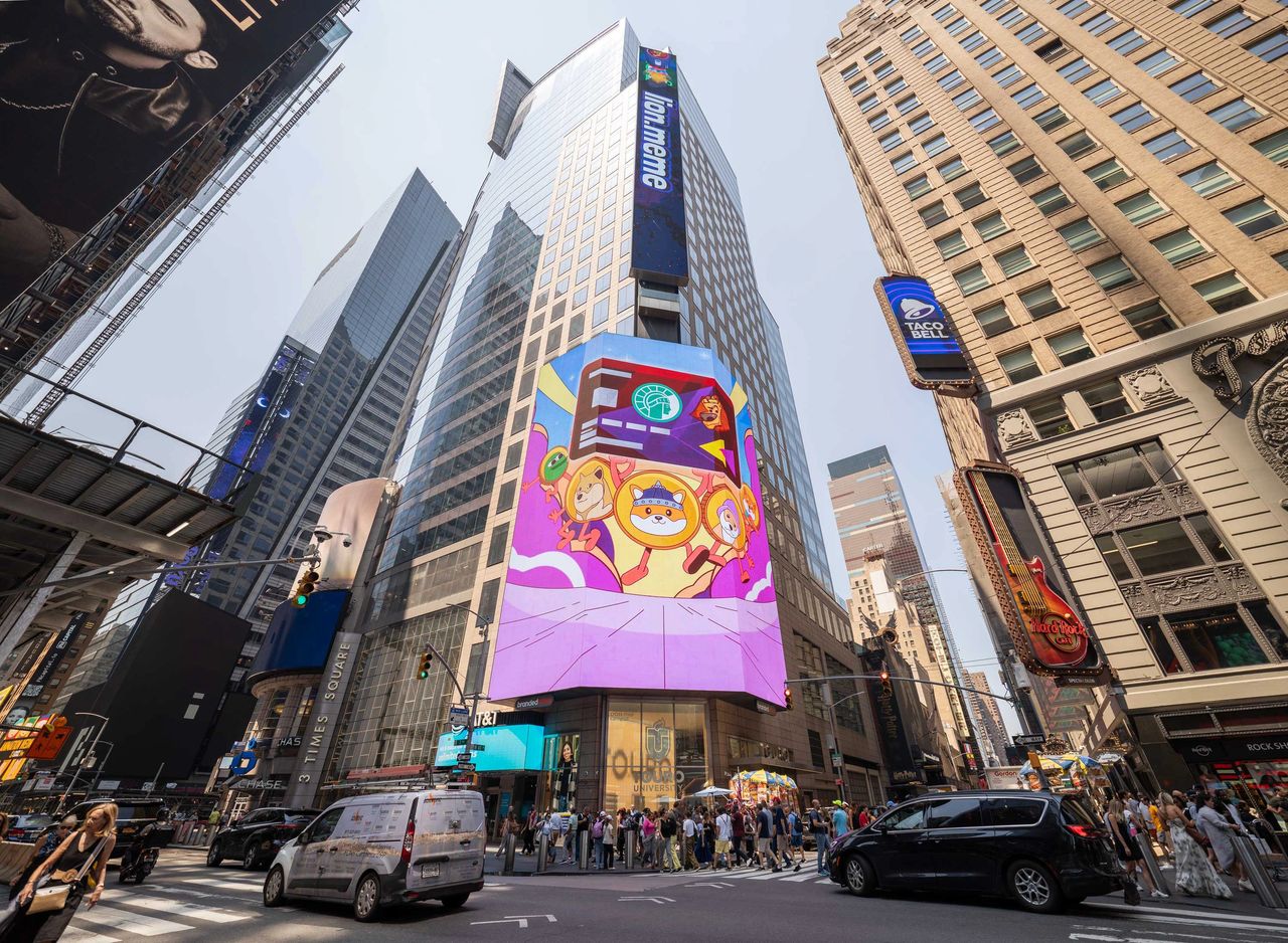 Colorful digital billboard in Times Square featuring animated characters, surrounded by busy streets and pedestrians, representing vibrant brand activation in a bustling urban environment.
