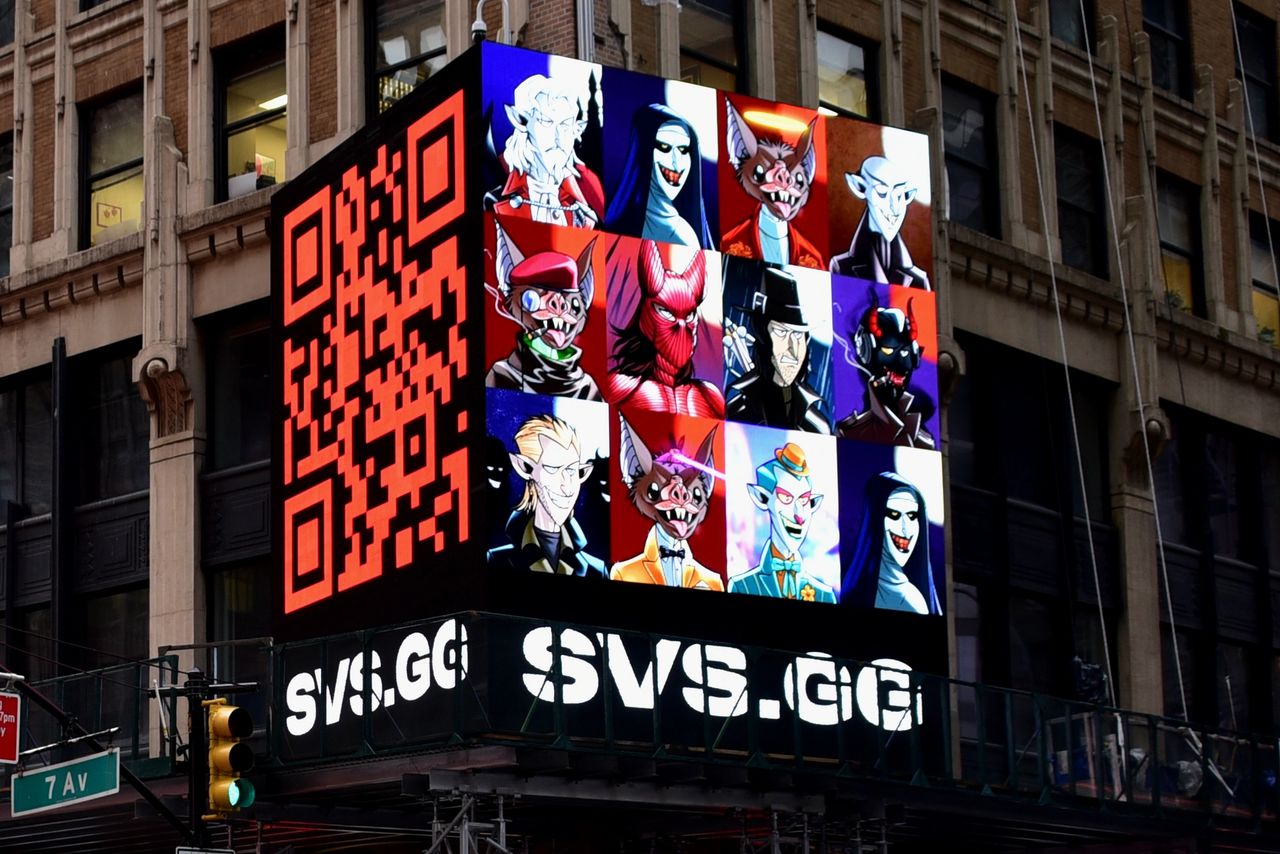 Digital billboard displaying vibrant animated characters, QR code, and website URL "SVS.GG," emphasizing interactive digital OOH advertising.