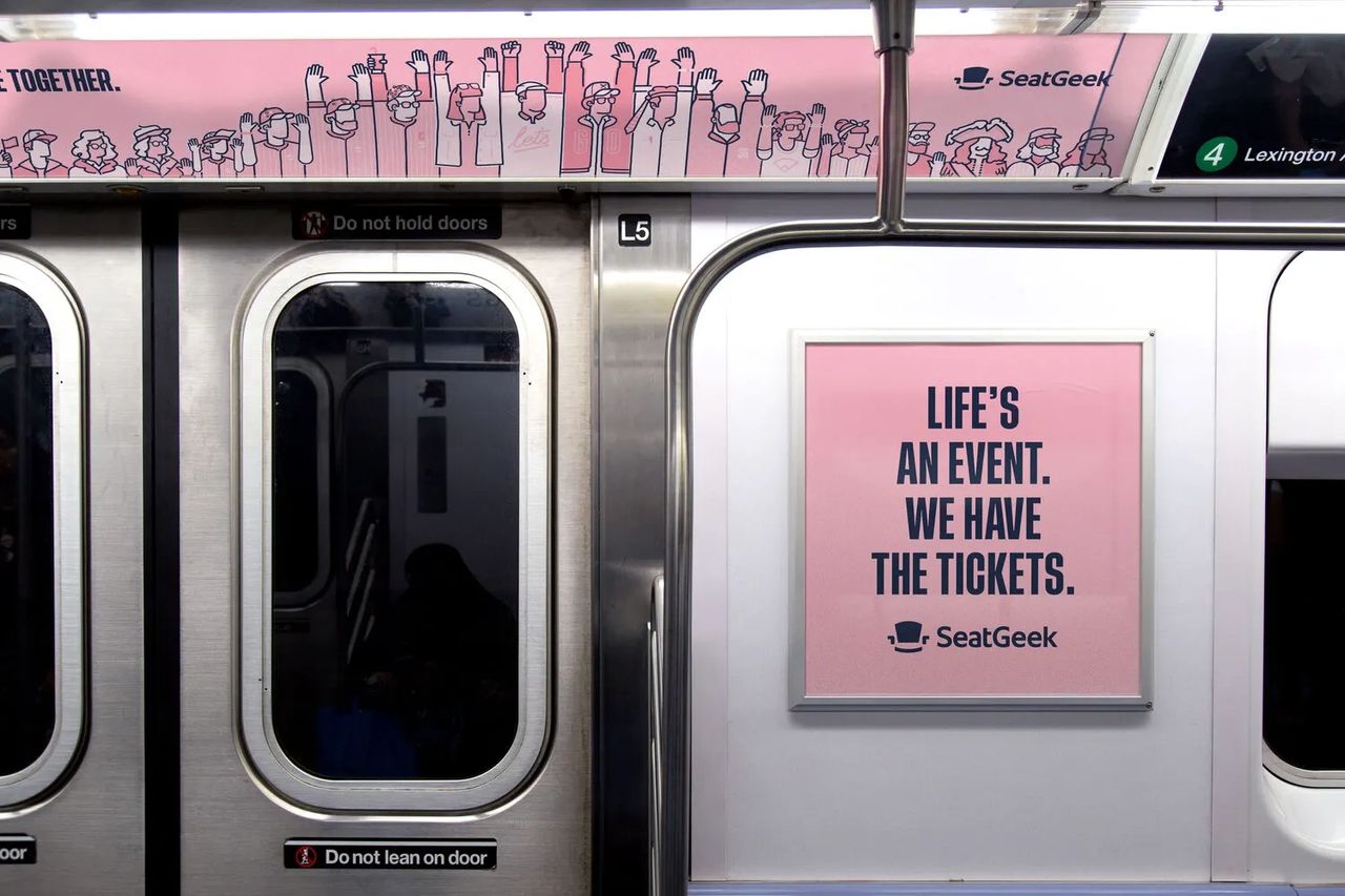 Subway advertising's diverse tactics, such as station domination, platform wraps, and digital screens, offer ingenious ways to reach and captivate audiences. Subway interior featuring SeatGeek advertisement with the slogan "LIFE'S AN EVENT. WE HAVE THE TICKETS." and playful illustrations of people with raised hands, emphasizing the creative potential of subway advertising.