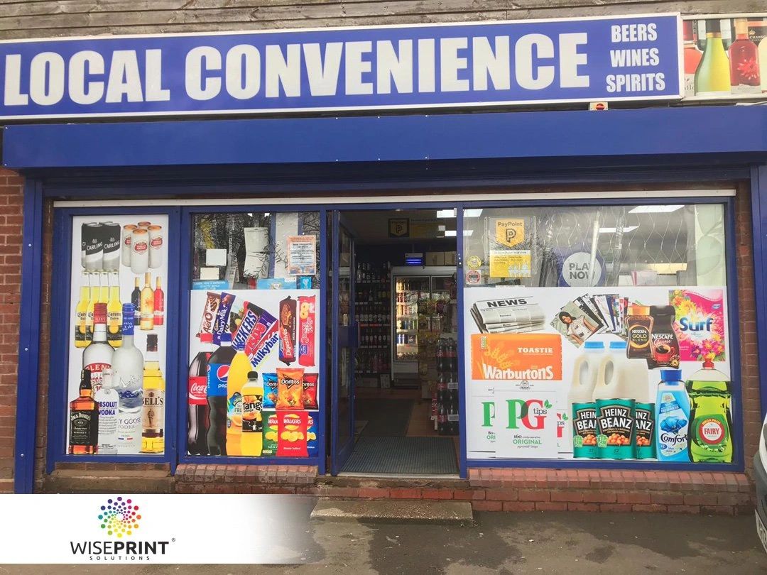 Short and impactful headlines are key when it comes to gas station advertising. Local convenience store front displaying a variety of products including beverages, snacks, and household items, emphasizing guerrilla marketing strategies for effective advertising placement.