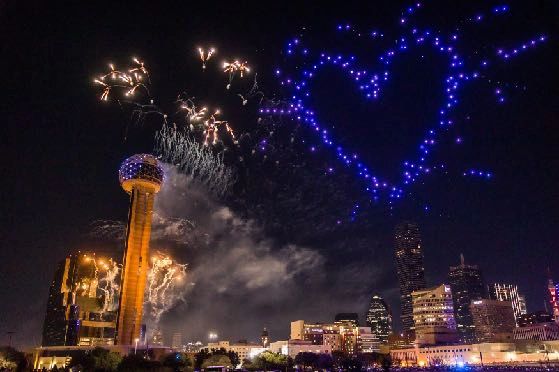 With the rise of technology and innovation, drones have become an invaluable tool for creating engaging content in advertising. Drone light show over Dallas skyline featuring illuminated heart shape and fireworks, showcasing advanced LED technology and pixel mapping for captivating visual displays.