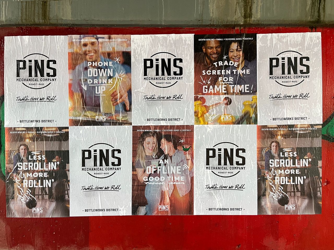 Collage of vibrant posters for PiNS Mechanical Company, promoting activities like bowling and gaming, with slogans encouraging reduced screen time and increased social interaction, located in the Bottleworks District, Maine.