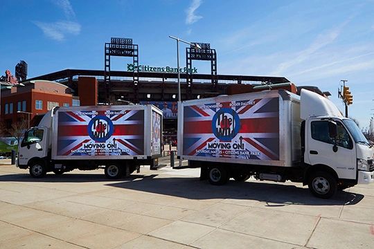LED trucks across Philadelphia LED billboard trucks promoting The Who concert at Citizens Bank Park, featuring vibrant graphics and messaging, positioned for maximum visibility in Philadelphia.