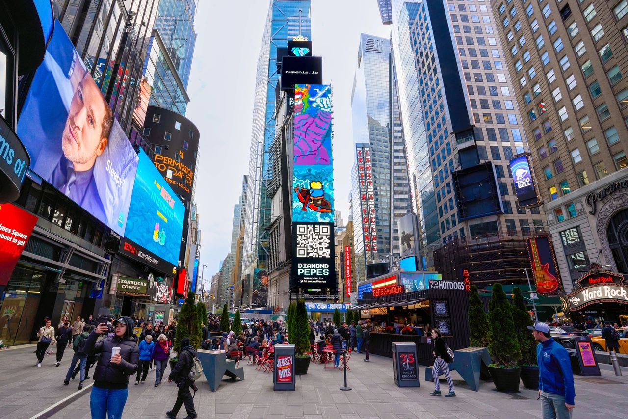Unlike digital ads that can easily be ignored or forgotten, OOH marketing offers a tangible presence that leaves a lasting impression on consumers. Billboard advertisements in Times Square showcasing vibrant digital displays and diverse brands, illustrating the impact of outdoor advertising in urban environments.