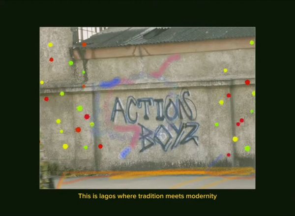Graffiti saying ACTIONS BOYZ on a wall in Lagos.
