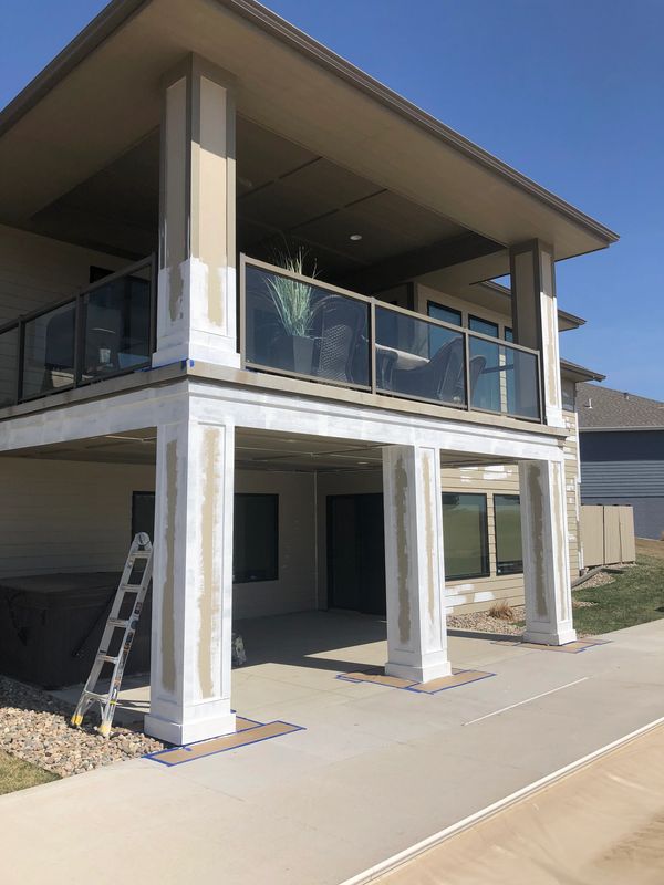  back patio before too coat and railing