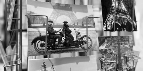 Black and white postcards featuring Paris landmarks and vintage scenes.