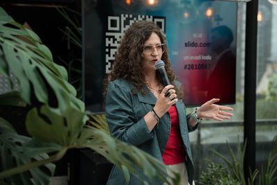 Photo by Sandis Lazda of Liene Freija Lund speaking at Intense Media Baltic event 