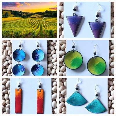 Collage of enamel earrings on the display