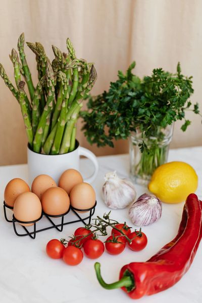 Fresh ingredients arranged on a white surface.