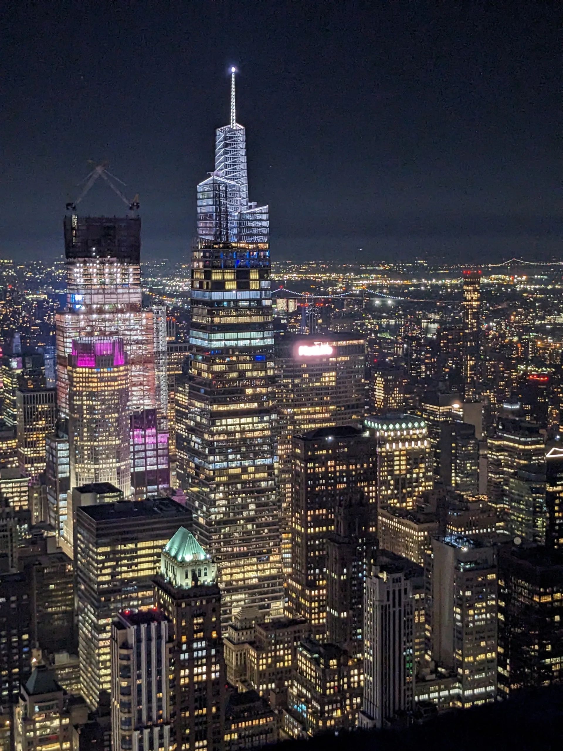 Nighttime view of NYC's midtown east including One Vanderbilt and the beautiful Heckscher building