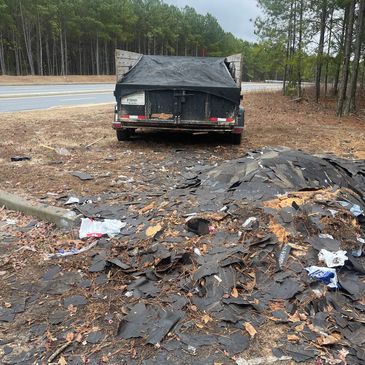 Pictured above is a roadside clean up of shingles that someone dumped on private property