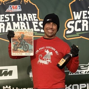 Nick The Pest Control Guy with trophies.