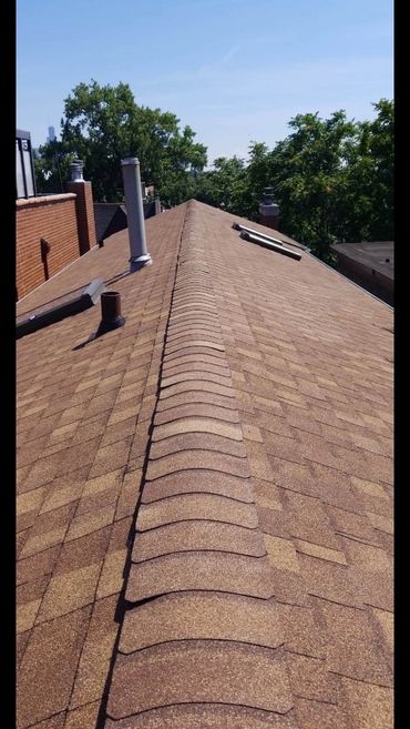 a shingle roof fully installed by green world construction 
