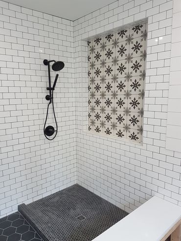 custom shower with hand shower