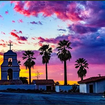 California mission bell tower wedding venue at sunset