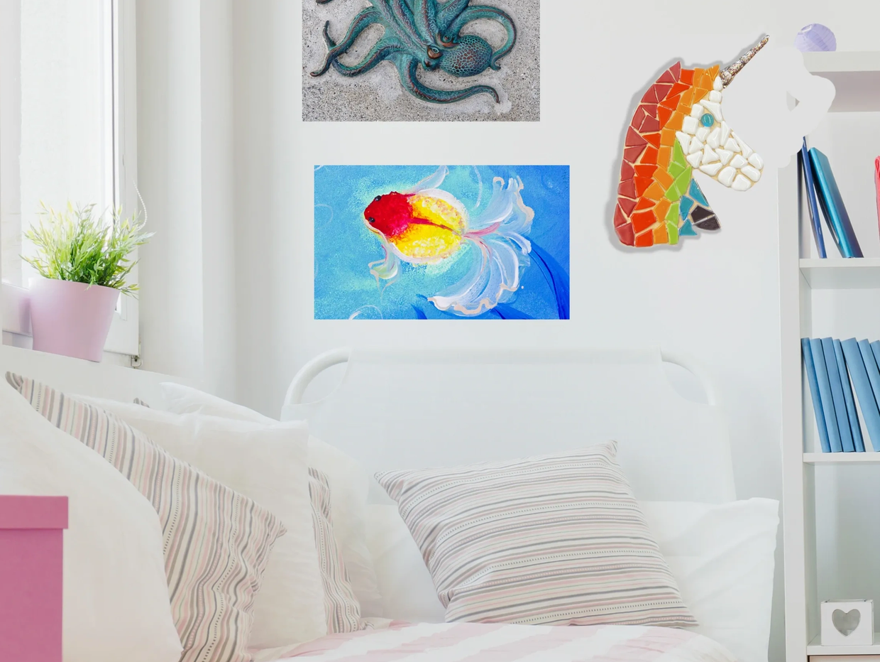Bed with colorful turtle and fish wall art, and a unicorn mosaic.