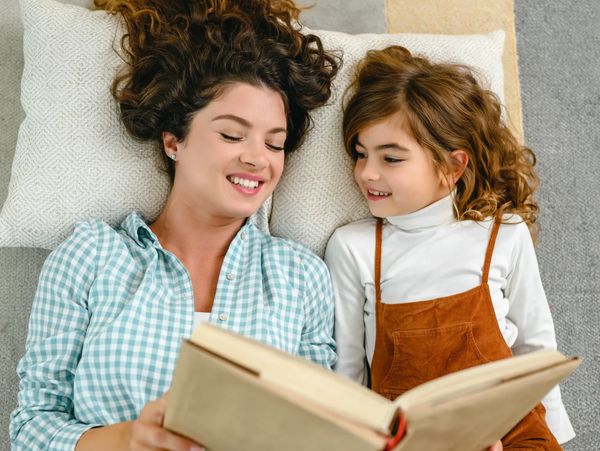 Mom reading to Child
