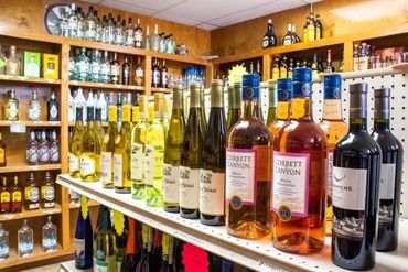A Store WIth Shelves Of Wine Bottles