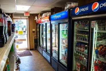 A Wending Machine With Soft Drinks