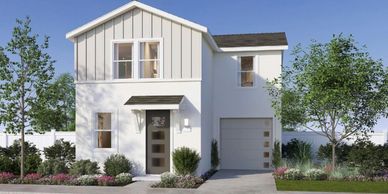 Modern two-story white house with garden and garage.