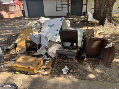 Pile of trash near curve. 