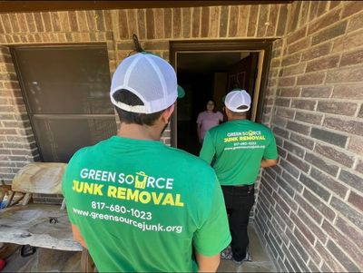 Green Source Junk Removal employees talking to a customer in Fort Worth, TX