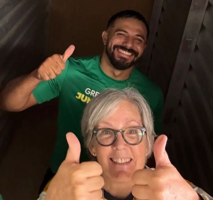 Green Source Junk Removal owner smiling with happy customer