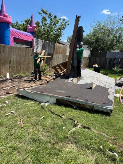 Green Source Junk Removal team removing a shed in Weatherford, TX