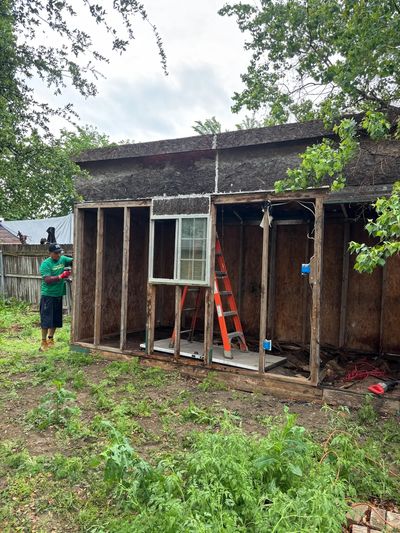 Green Source Junk Removal removing a shed in Arlington,TX