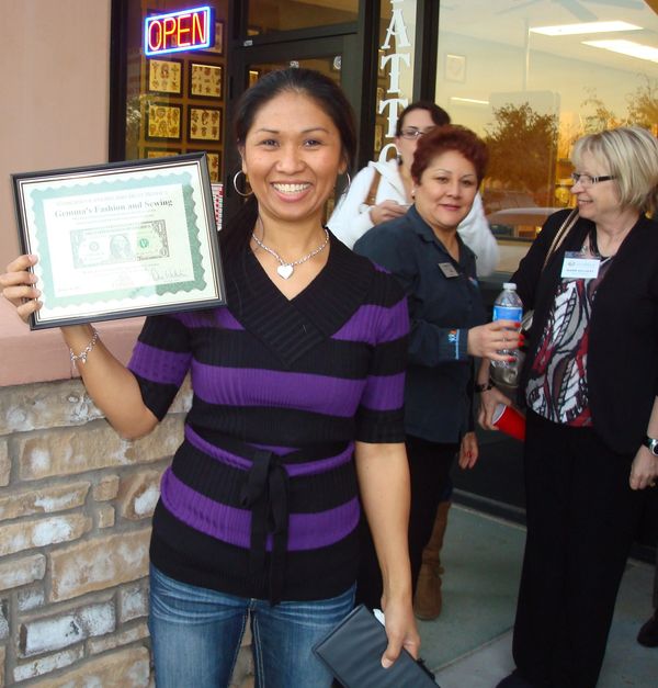 a woman with a certificate in her hand 