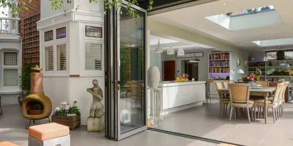 Open-concept living space with indoor-outdoor flow and modern decor.