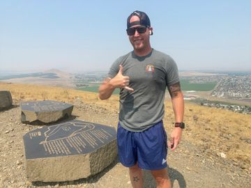 Richland Teacher Forrest McKinnis hiking Candy Mountain in Richland Washington