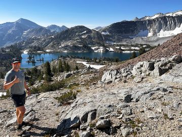 Forrest McKinnis conquers Glacier Pass in Wallowa Mountains,experiencing breathtaking alpine beauty.