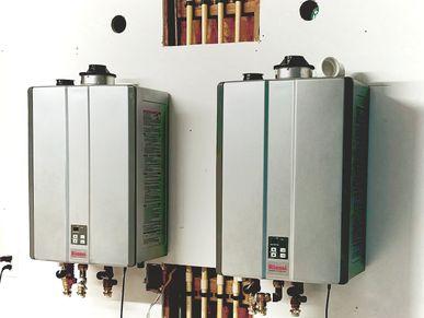 Replacing an old water heater with a new energy-efficient unit in a Fleming Island home
