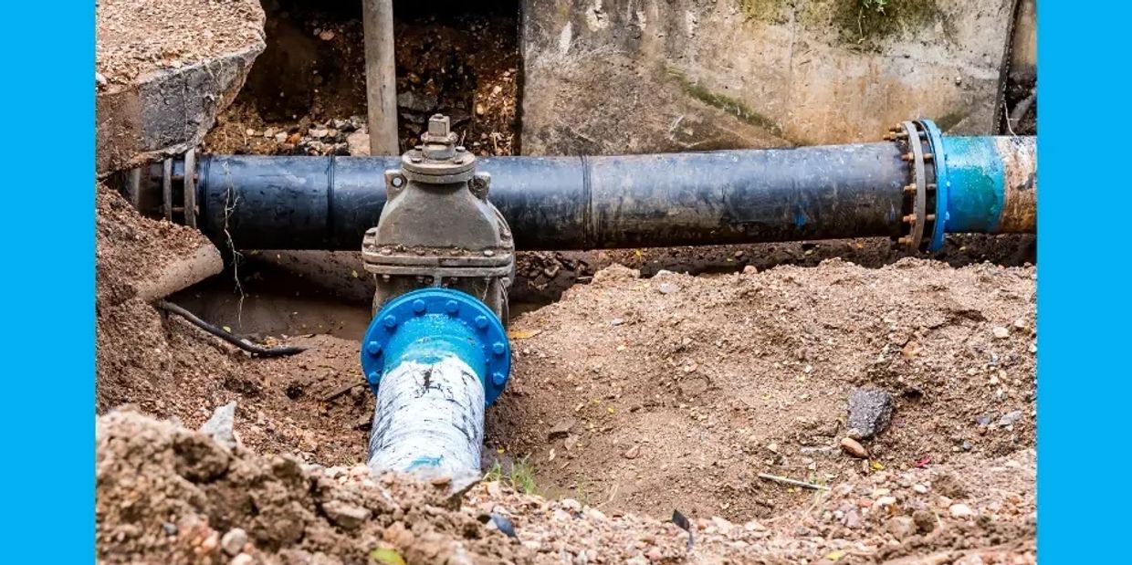 “Riverbend Plumbing technician performing sewer line repair on an older Jacksonville home with cast 