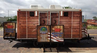 Western-inspired outhouse wrap from Gator Graphics