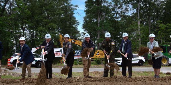 Event photography, showing local officials at a groundbreaking ceremony for a new Animal Shelter.